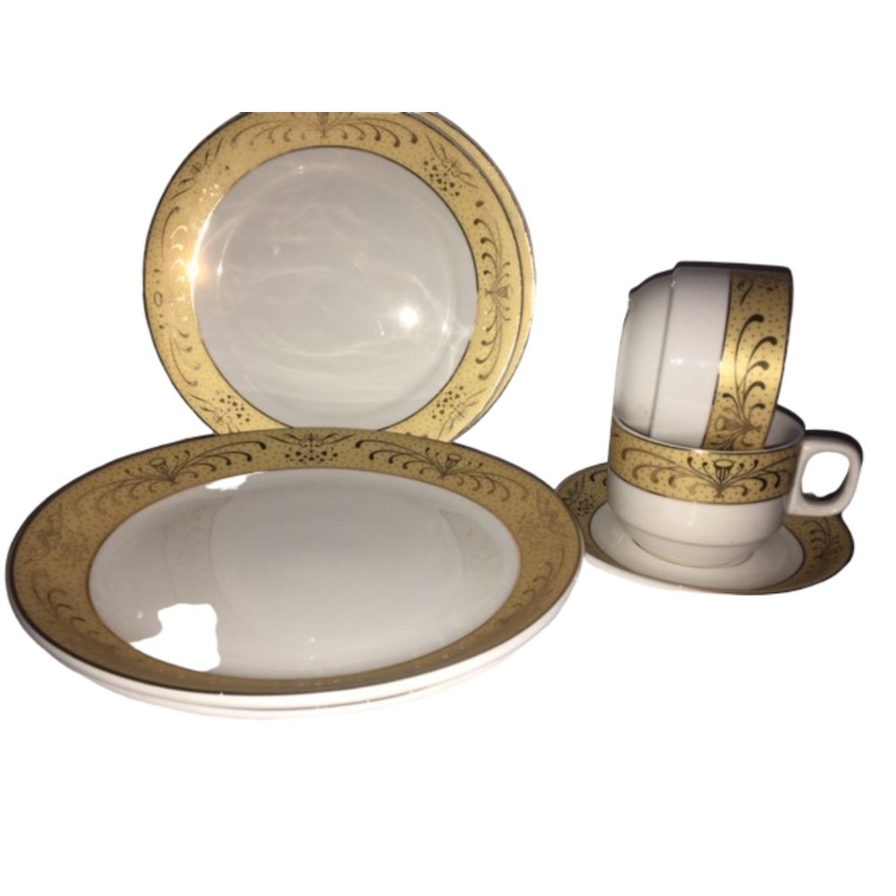 Gold & White plates, side plates, tea cups.